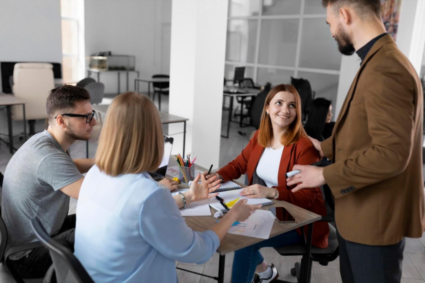 Professionals collaborating on financial analysis in a modern learning environment